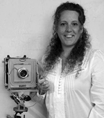 Portrait of Sheri Du Mont with her camera