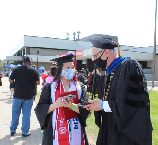 enyedi outside with student
