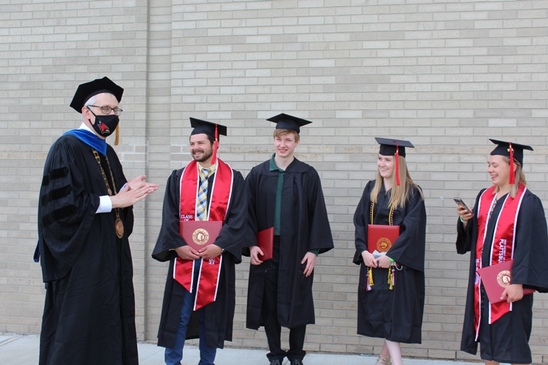 enyedi with students outside
