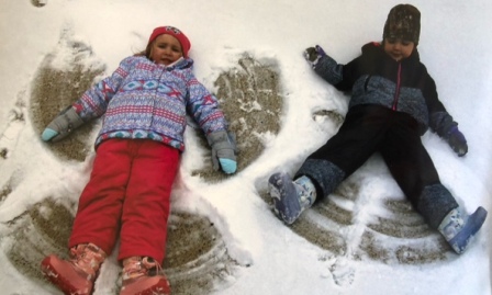 child care kids make snow angels