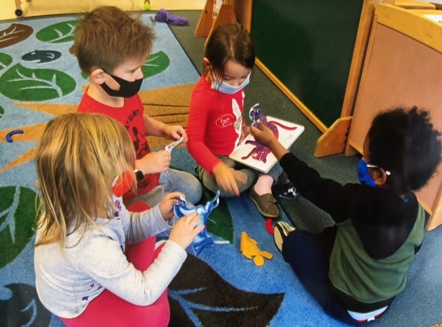 child care center kids play with one another