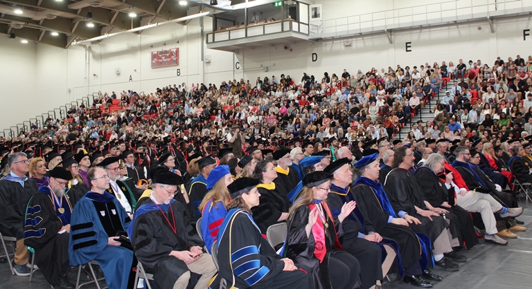faculty with crowd